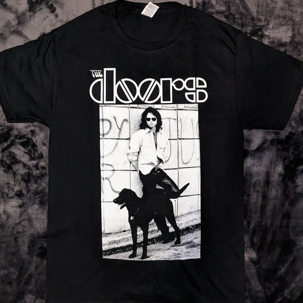 Jim Morrison with his dog in LA, 1968